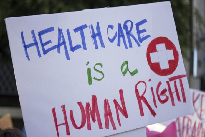 Biden Restores LGBTQ Healthcare Protections to ACA
