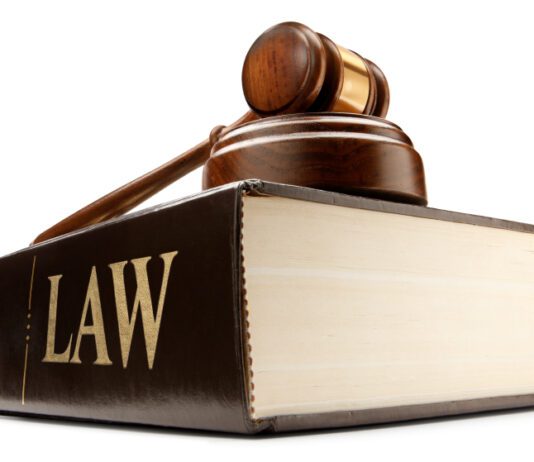 image of a court gavel on top of a law book