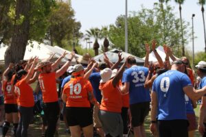 Our League Tucson teams high fiving