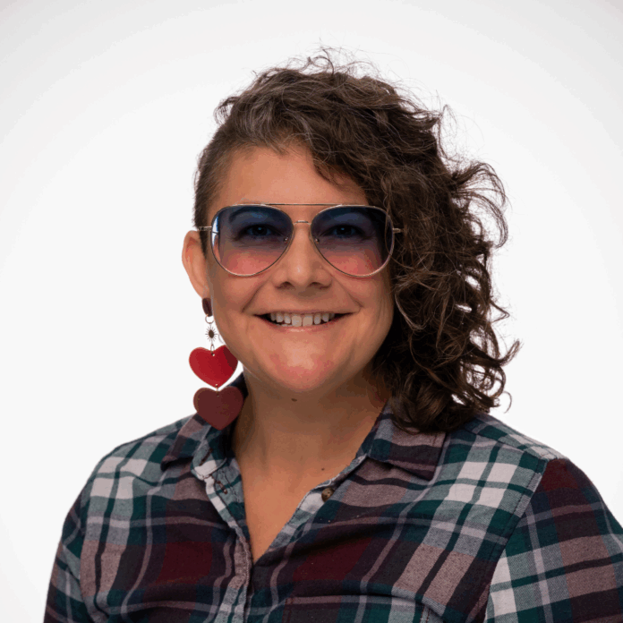 Portrait of Tucson artist and educator Angela Soliz, known for her vibrant acrylic paintings and intuitive, purpose-driven approach to art.